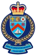 Эмблема Королевской полиции Сент-Китса и Невиса с изображением Короны