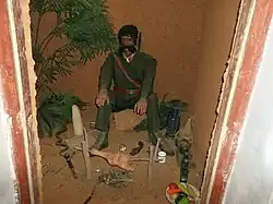 Фигура Вираппана, вырезанная из сандалового дерева