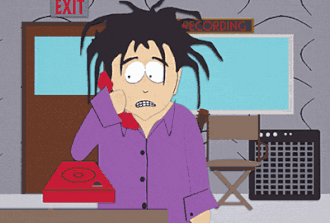 Роберт Смит у телефона.