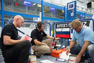 Слева направо: А.Герст, Г.Уайсмен и М.Сураев