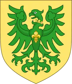 Зелёный орёл с распростёртыми крыльями на золотом поле, с золотой короной на шее и золотой лилией на груди.