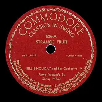 Обложка сингла «Билли Холидей и её оркестра» «Strange Fruit» ()
