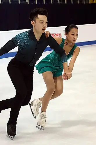 Ян Юнчао и его партнёрша Тан Фэйяона юниорском чемпионате мира (2019)