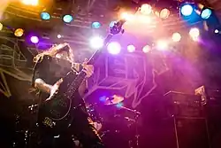 Во время выступления на фестивале Hole In The Sky, 2007