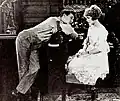 С Чарльзом Рэем[англ.] в фильме «Деревенский сыщик[англ.]» (1920)