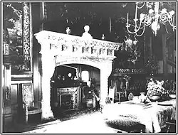 Внутренний вид виллы Менье. В кресле Анри Менье. Архитектор Стефан Совестр. 1905