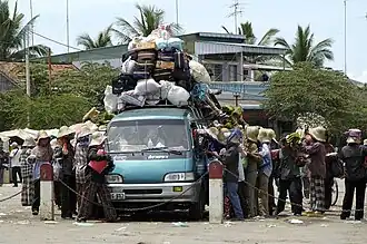 Торговцы в ожидании парома