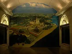 Фотообои на панели, закрывающей непостроенный выход на поверхность